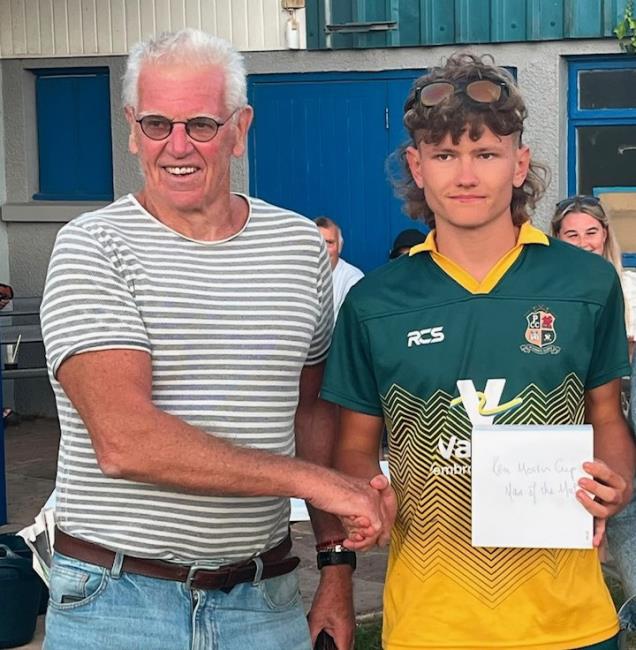 Adjudicator John Owen with Man of the Match Ollie Donohoe Adjudicator John Owen with Man of the Match Ollie Donohoe